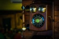 Old vintage wall mount telephone on brick wall