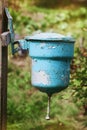 Old vintage washstand hanging outdoors, retro toning