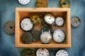 Old vintage watches in wooden box. Watch repair workshop background. Time concept. Royalty Free Stock Photo