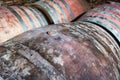 Old vintage wine barrels in wine cellar in Tuscany. Royalty Free Stock Photo