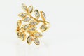 Old Vintage women gold diamond ring on white background
