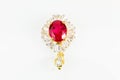 Old vintage women gold diamond with ruby brooch isolated on white background