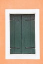 Old vintage wood door with old green wallpaper Royalty Free Stock Photo