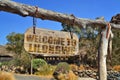 Vintage wood signboard with text welcome to Lilongwe. hanging on a branch