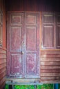 Old vintage wooden brown house door background. Royalty Free Stock Photo