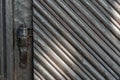 an old vintage wooden door in a Catholic church. Beautiful cast iron metal rusty vintage hinges on the gates of the Historical Royalty Free Stock Photo