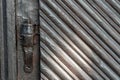 an old vintage wooden door in a Catholic church. Beautiful cast iron metal rusty vintage hinges on the gates of the Historical Royalty Free Stock Photo