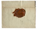 Old vintage yellowed envelope with red wax seal - isolated on white background Royalty Free Stock Photo