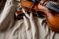 An old violin bow resting on a weathered sheet of music Royalty Free Stock Photo