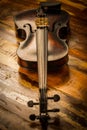 Old violin in vintage style on wood Royalty Free Stock Photo