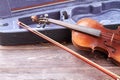 Old violin on wooden background. Royalty Free Stock Photo