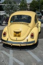 Old Volkswagen yellow beetle parked in the street