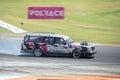 Old Volvo 240 station wagon tuned up with a twin-turbo engine drifting on the racing circuit