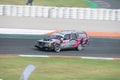 Old Volvo 240 station wagon tuned up with a twin-turbo engine drifting on the racing circuit