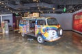 Old VW bully painted in hippie style of the sixties at the entrance of Madame Toussauts cabinet