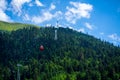 Old waggon moves along cable car in sunny weather. Royalty Free Stock Photo