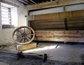 Old wagon wheel at granary in Batsto Village NJ in color
