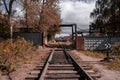 Old wagons on the railway tracks of an abandoned factory Royalty Free Stock Photo
