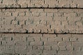 Old wall of bricks dull colors. Royalty Free Stock Photo