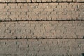 Old wall of bricks dull colors. Royalty Free Stock Photo