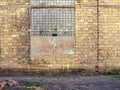 Old wall of a building brick coquina, broken glass Royalty Free Stock Photo