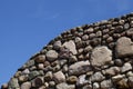 The old wall of the building is made of stones and cobblestones Royalty Free Stock Photo