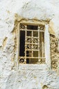 A small window with old grill, Sfax, Tunisia Royalty Free Stock Photo