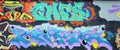 Colorful background of graffiti painting artwork with bright aerosol outlines on wall. Old school street art piece made Royalty Free Stock Photo