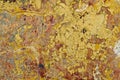 Old wall with falling off paint and plaster. A few cracks. Royalty Free Stock Photo