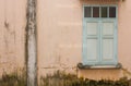 Old wall with green window Royalty Free Stock Photo