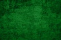 Old wall grunge background with delicate abstract texture and dirty paint. Green paint with brush and cement wall Royalty Free Stock Photo