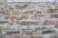 Old wall made of big stones and broken bricks Royalty Free Stock Photo