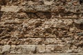 Old wall made of rough stones in the Roman Theater of Merida