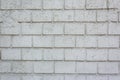 Old Wall Made Of White Brick, Painted White In Loft Style. Background of white building bricks. Textured vintage Royalty Free Stock Photo
