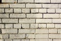 Old Wall Made Of White Brick, Painted White In Loft Style. Background of white building bricks. Textured vintage Royalty Free Stock Photo