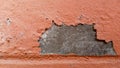 Old wall paint peeling off, making small sheets Royalty Free Stock Photo