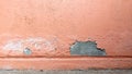 Old wall paint peeling off, making small sheets Royalty Free Stock Photo