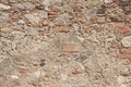 Old Wall of Red Bricks and White Brayed and Cracked Old Paint. Red, Terracotta and White Brick Background. Old Wall for Background Royalty Free Stock Photo