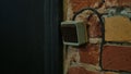 Old Wall Switch on Exposed Brick Background in Vintage Setting Royalty Free Stock Photo