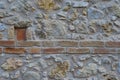 Old wall texture made of stones, bricks and concrete. Old house and buildings Royalty Free Stock Photo