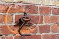 Old brick wall with metal hook Royalty Free Stock Photo