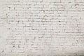 Old wall from a white brick with a regular laying. Royalty Free Stock Photo