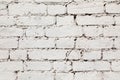 Old wall from a white brick with a regular laying. Royalty Free Stock Photo