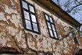 Old wall and windows of housse