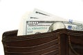 Old wallet with banknotes of US dollars inside Royalty Free Stock Photo