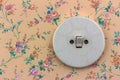 Old wallpaper with light switch Royalty Free Stock Photo