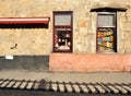 Old walls, shop windows with colorful honey cakes