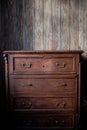 Wooden cupboard or sideboard. Old wardrobe in vintage style. Case for storing things. Royalty Free Stock Photo