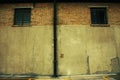 Old warehouse brick wall with two windows