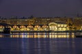 Old warehouse buildings Valencia harbor, port nautical scenet night lights reflection Royalty Free Stock Photo